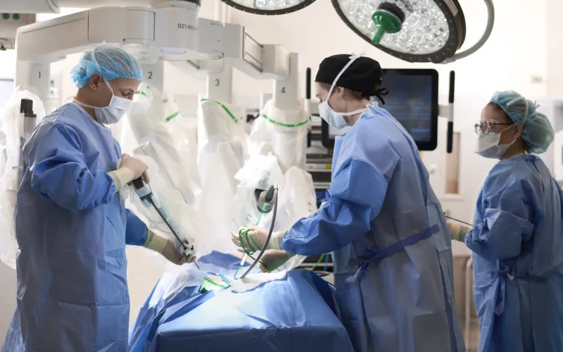 Dr. Rocca demonstrating use of a surgical robot